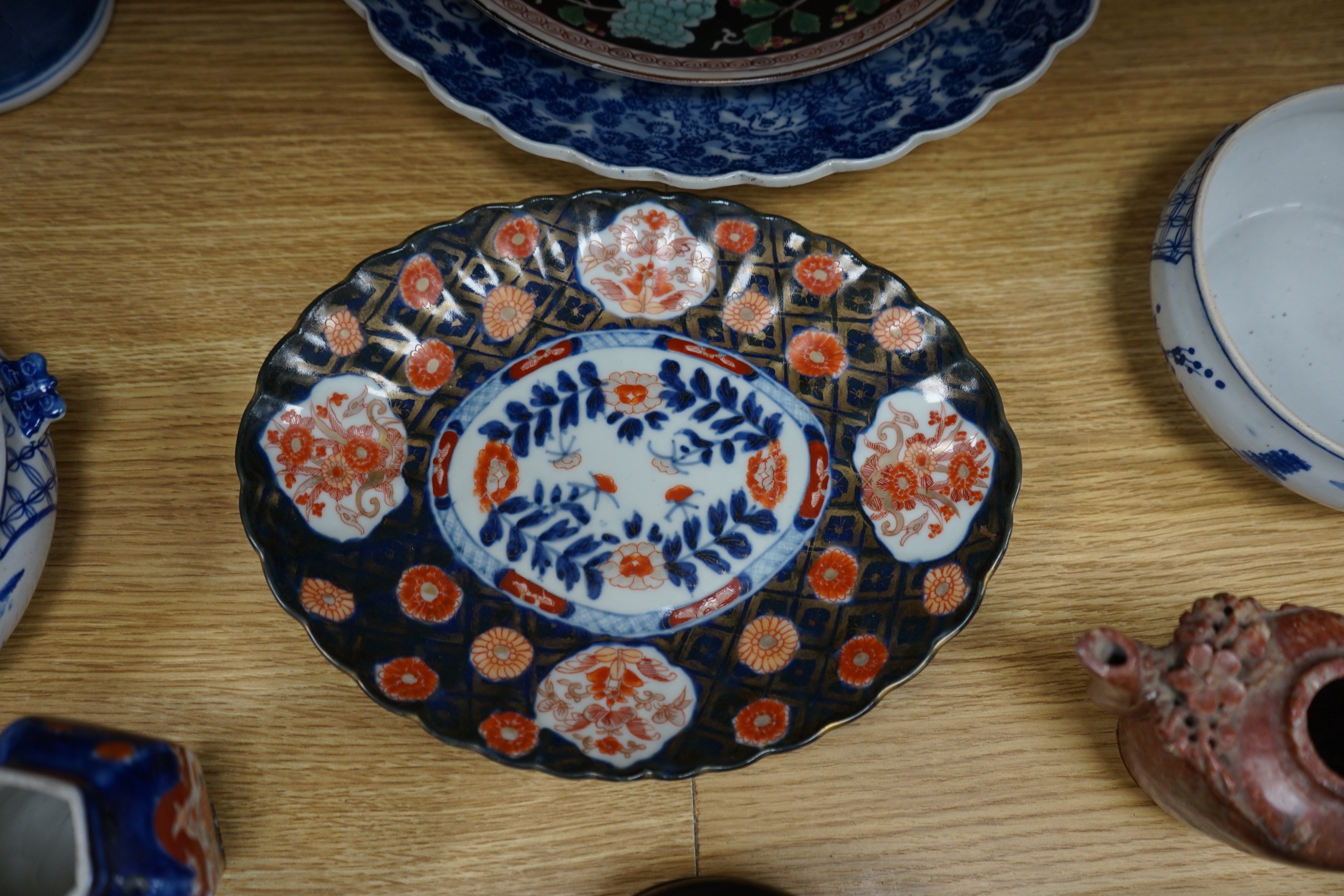 An early 20th century Chinese blue and white prunus vase, group of Chinese, Japanese porcelain Rex Hotel tureens, soapstone wine pot etc
